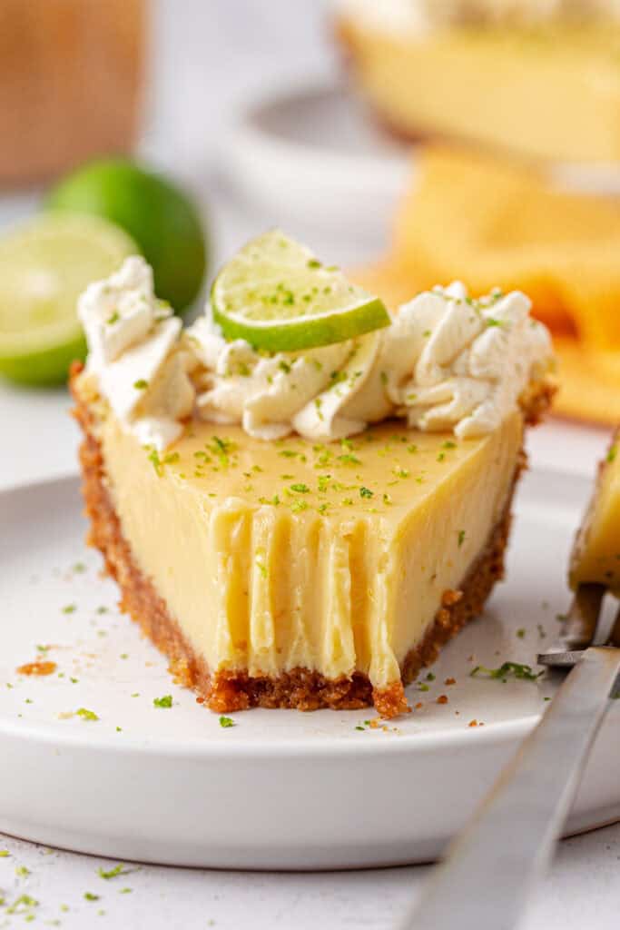 slice of key lime pie with a bite missing