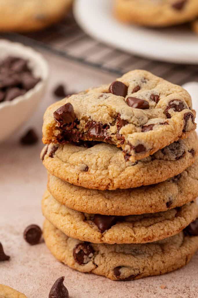 a stack of eggless chocolate chip cookies