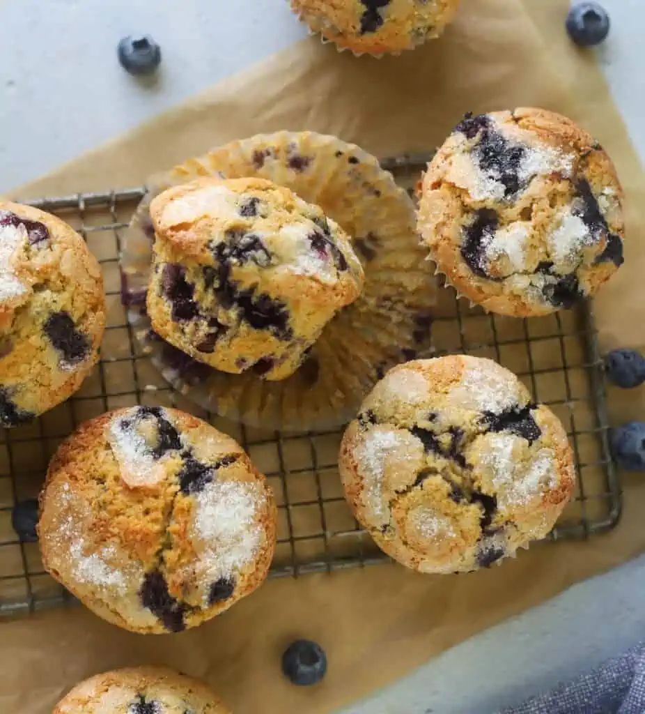 whole wheat blueberry muffins on a wire rack
