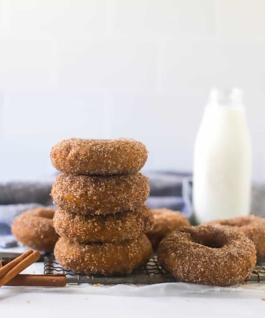 pumpkin donuts stacked on top of each other