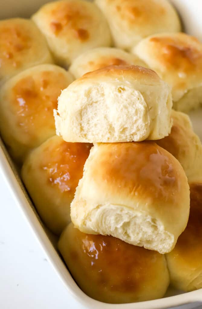 close up of two dinner rolls