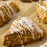 pumpkin scone on a baking sheet lined with parchment paper