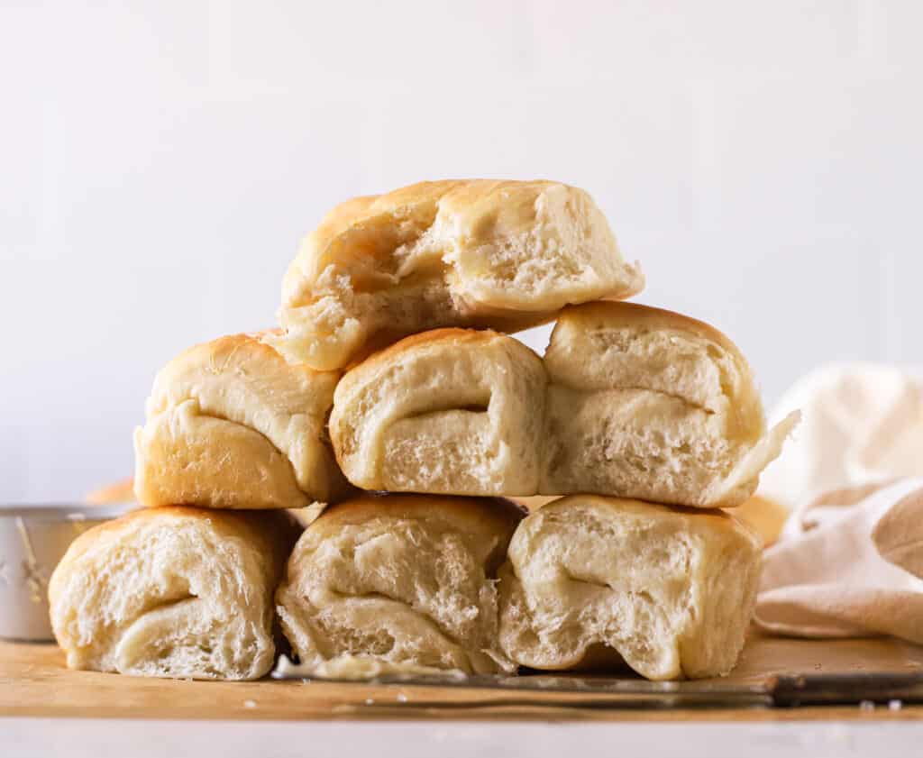 a stack of parker house rolls