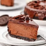 slice of triple chocolate cheesecake on a plate