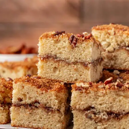 three squares of cinnamon coffee cake stacked
