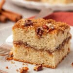 a slice of cinnamon coffee cake on a plate