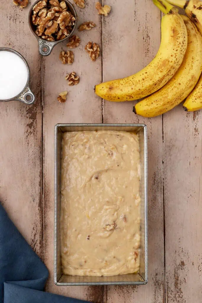 unbaked banana bread in loaf pan