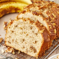 slices of banana nut bread on a cooling rack