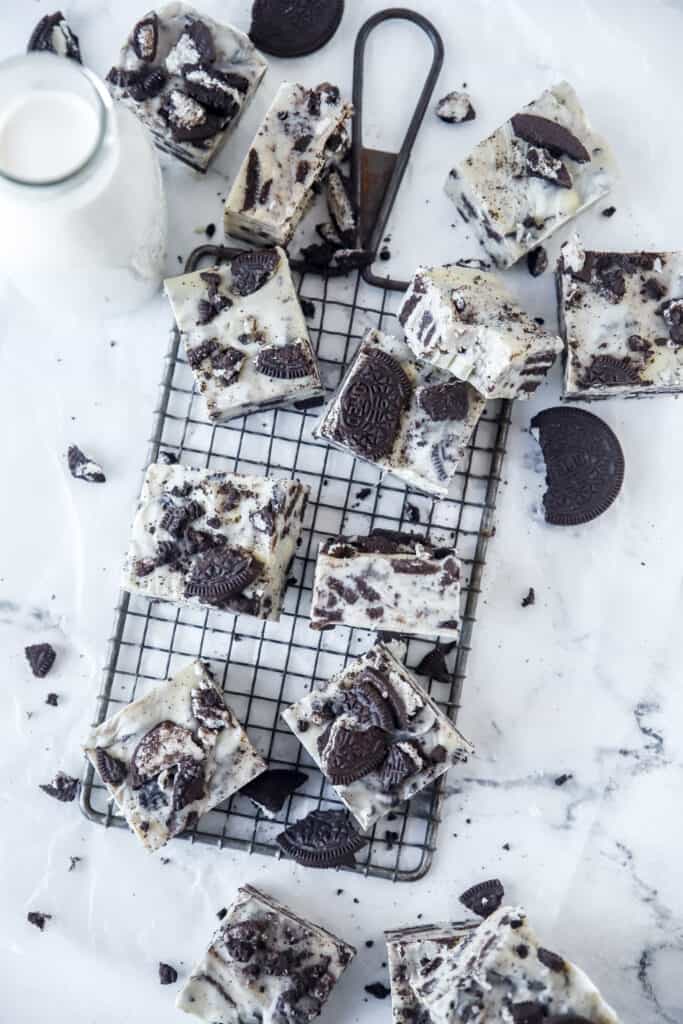 squares of white chocolate fudge on a cooling rack