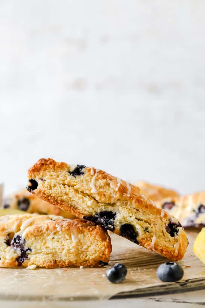 two blueberry lemon scones stacked on each other