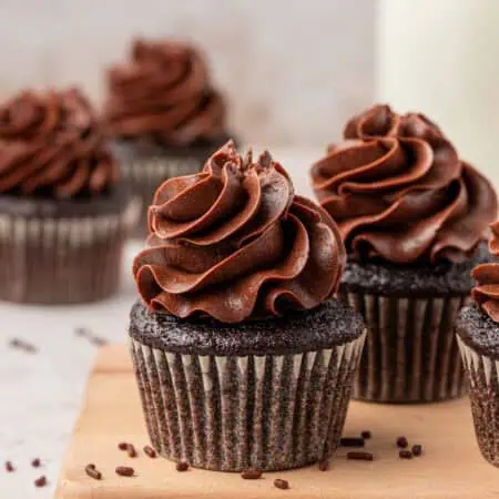 chocolate cupcakes topped with chocolate buttercream frosting