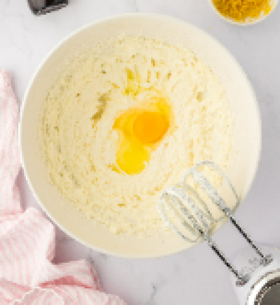 egg added to creamed butter and sugar
