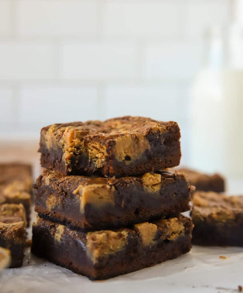 three peanut butter brownies stacked