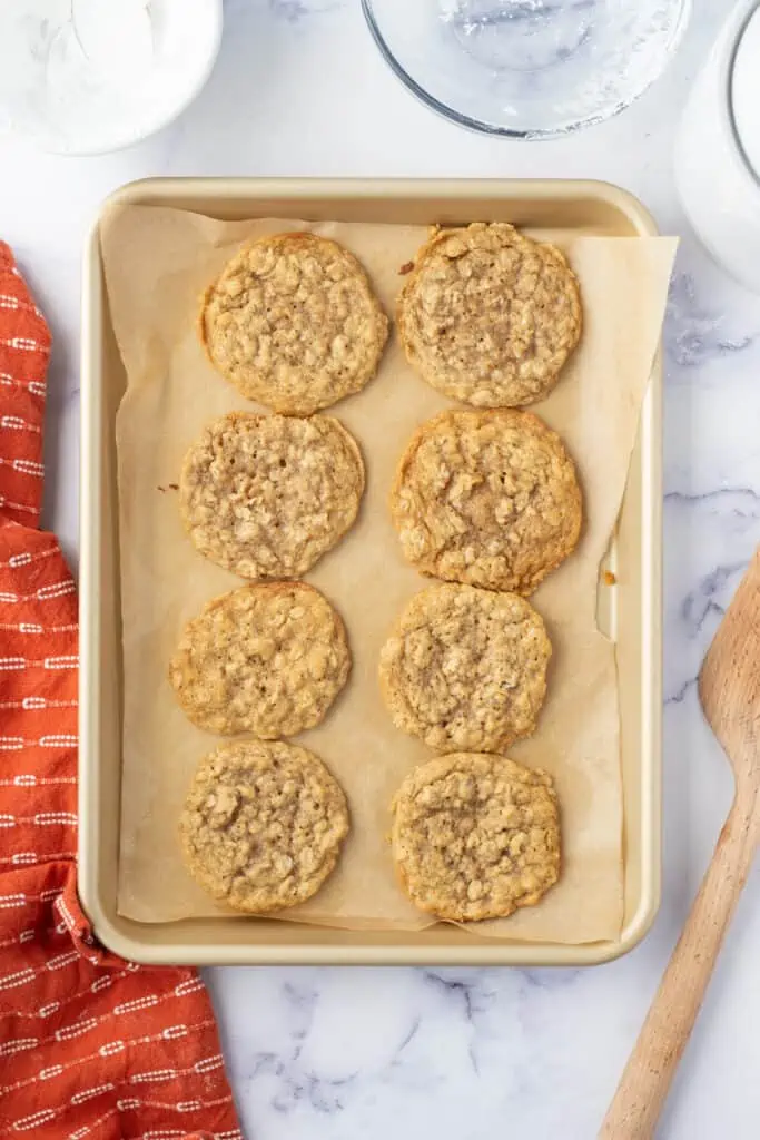 baked oatmeal cookies on a cookie sheet