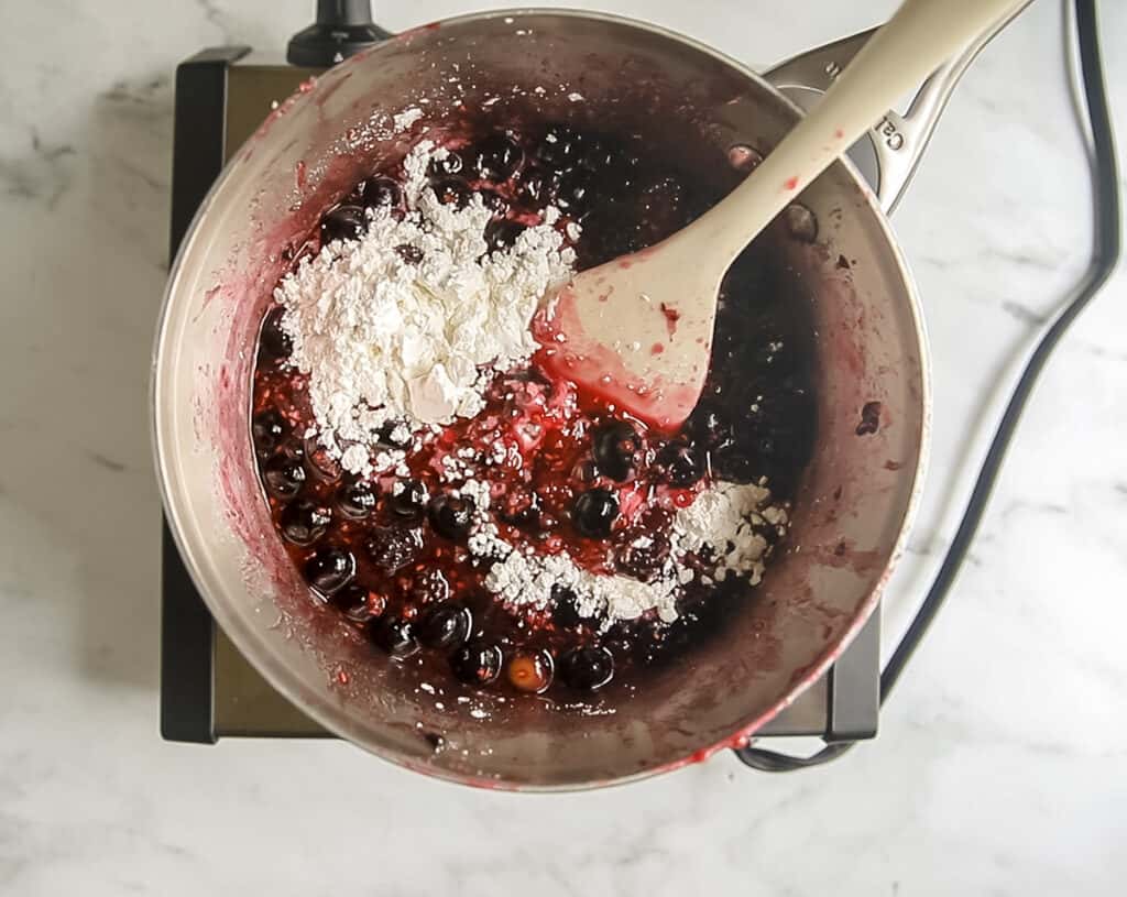 cornstarch added to berry pie flling on stovetop