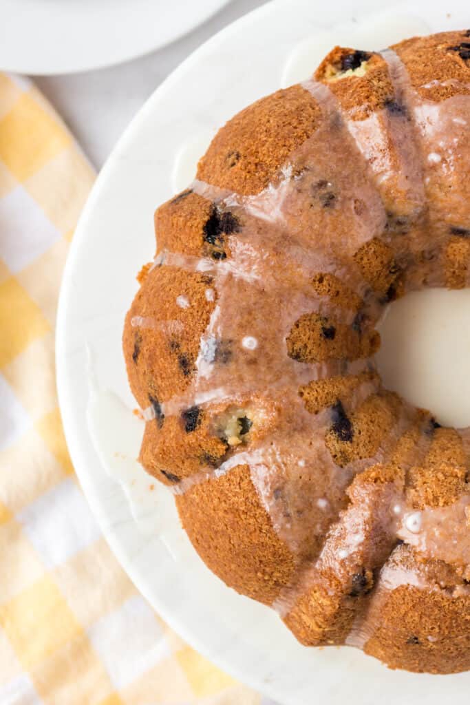 top down view of blueberry bundt cake on a cake stand