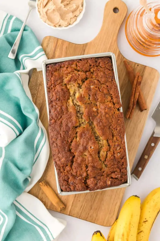 baked sour cream banana bread in a loaf pan