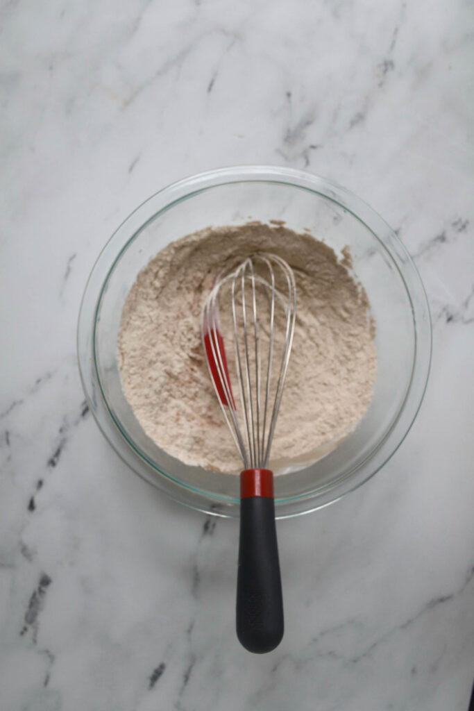 pumpkin bread dry ingredients bowl with whisk