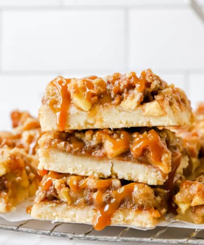 three caramel apple bars stacked on top of each other