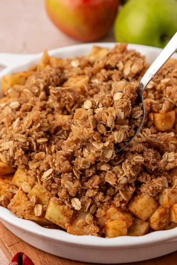 oat topping sprinkled over apple filling