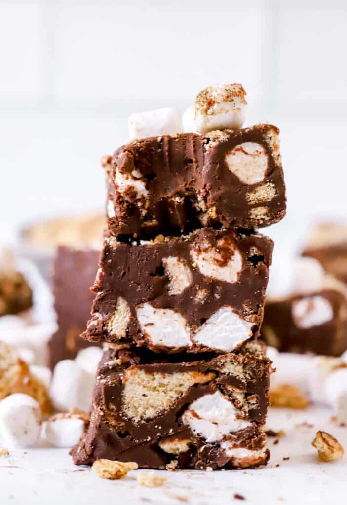 three smores fudge squares stacked on top of each other