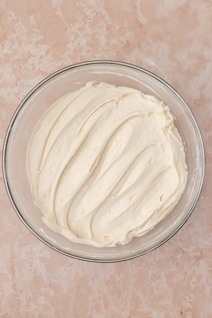 cream cheese frosting in a bowl