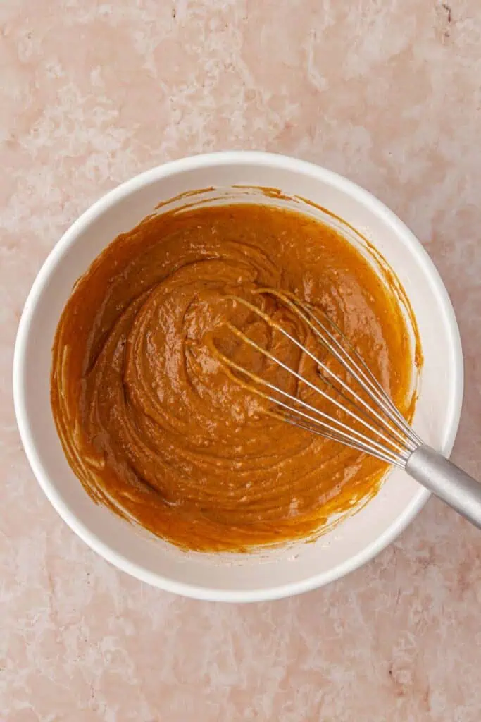 pumpkin cupcake batter in a bowl
