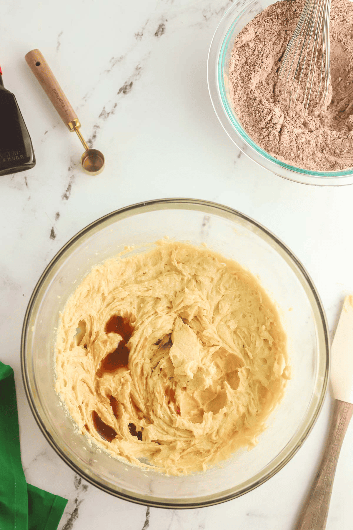 extracts added to bowl of creamed butter sugar mixture