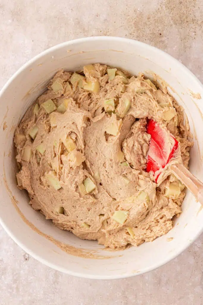 apples folded into cake batter