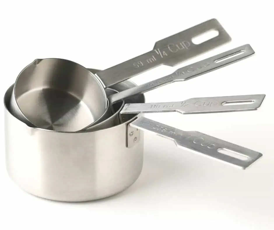 a set of metal dry measuring cups