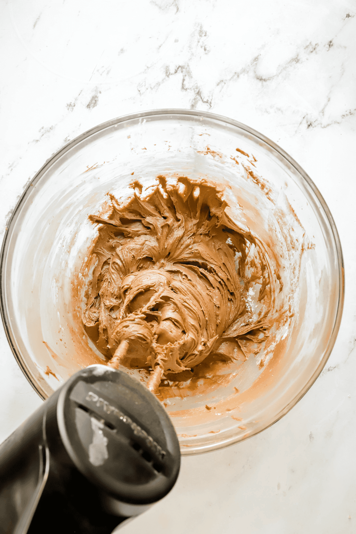 hand mixer mixing brownie batter dip