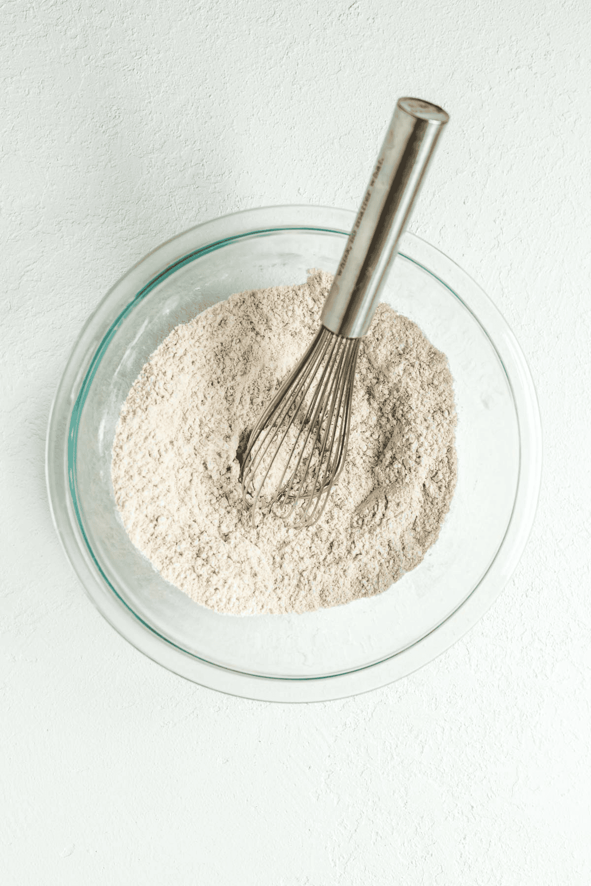 bowl of dry ingredients in a large bowl with a whisk