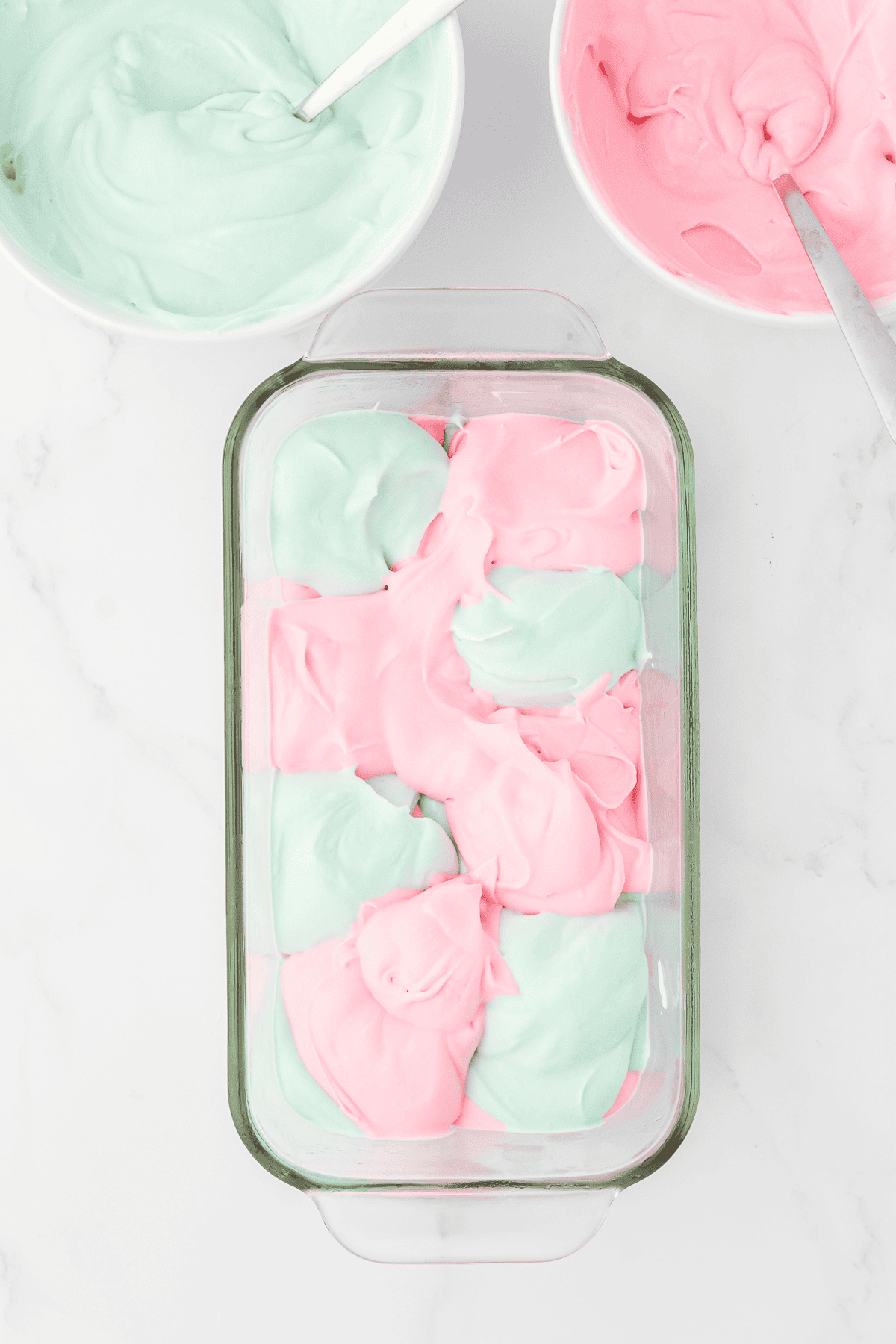 pink and blue cotton candy ice cream in loaf pan