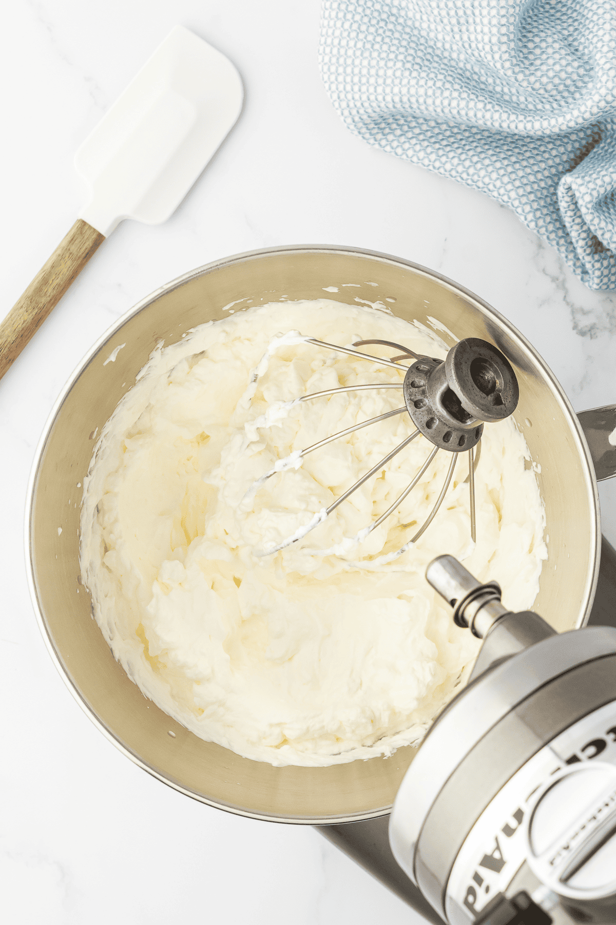 whipped cream in bowl for cotton candy ice cream recipe