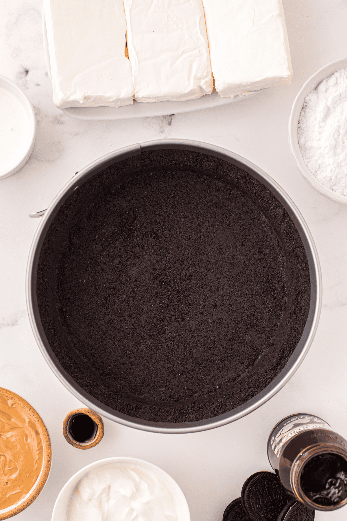Oreo crust in a springform pan