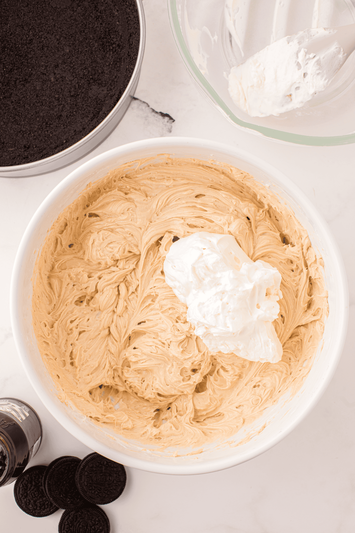whipped cream added to peanut butter cheesecake filling