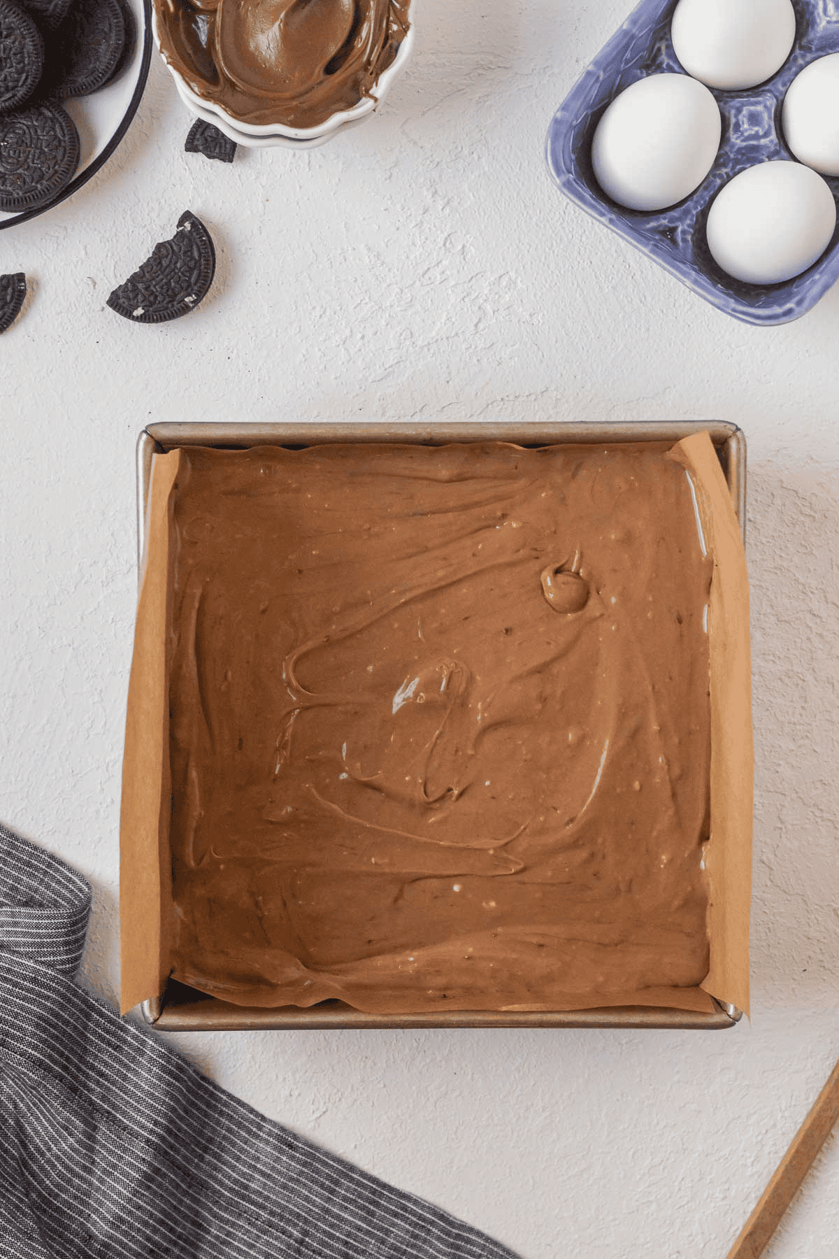 Nutella cheesecake batter in pan
