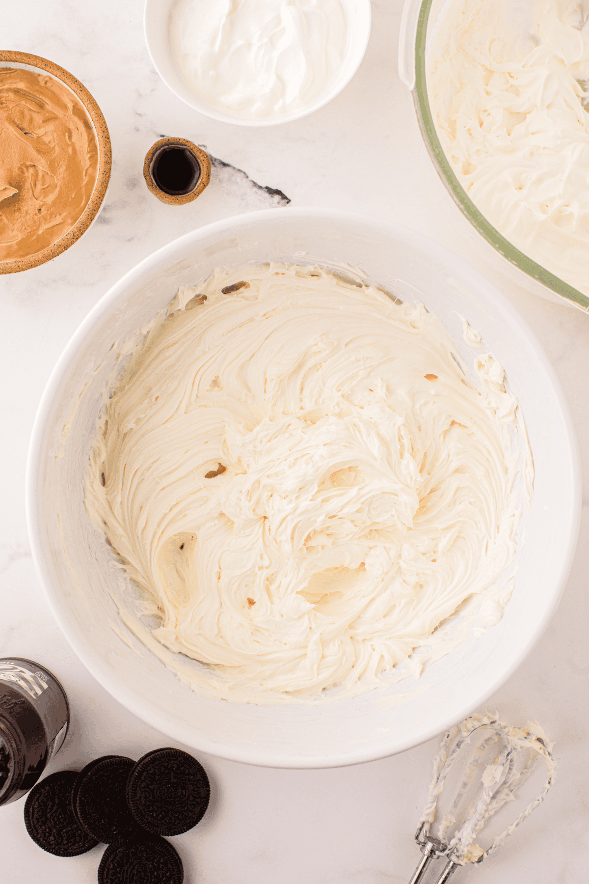 cream cheese and powdered sugar beaten together in a bowl
