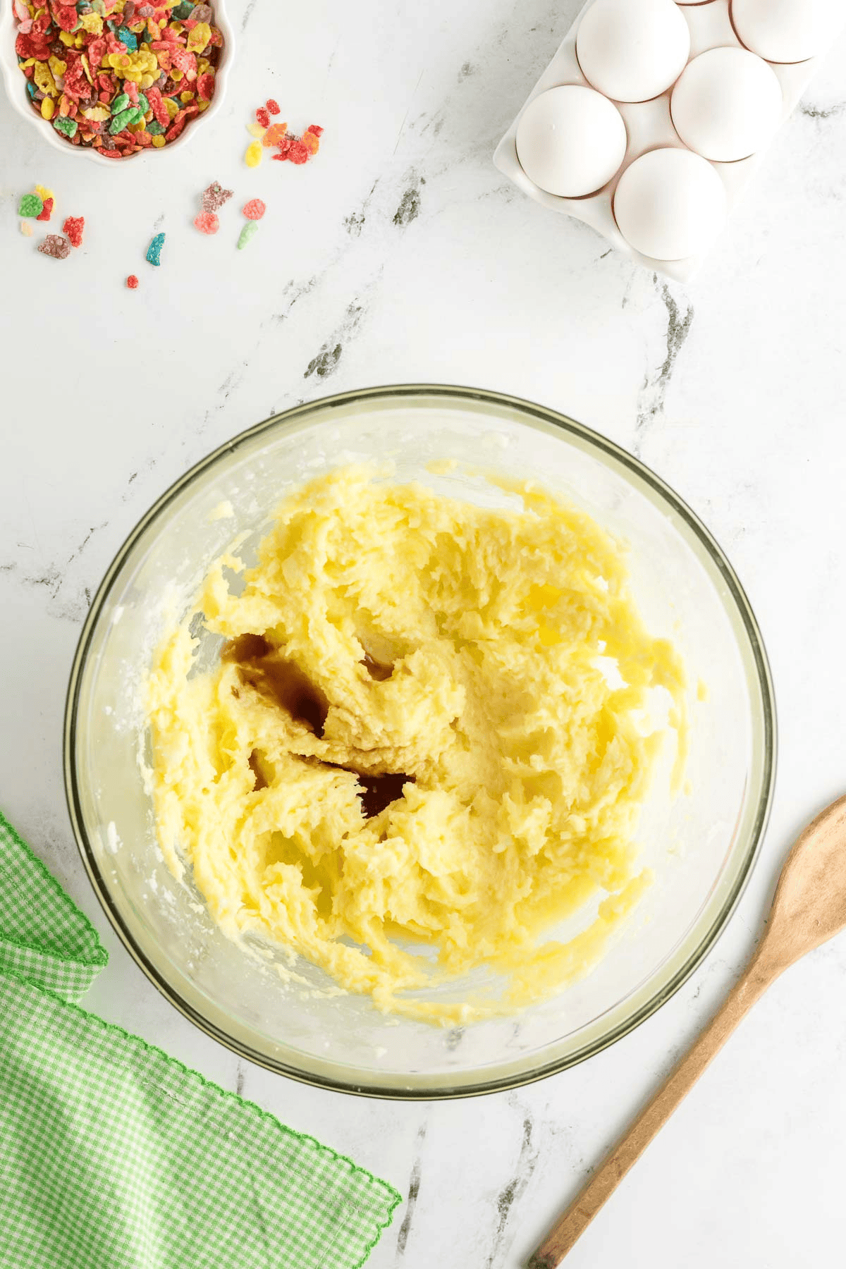 vanilla extract added to bowl of sugar cookie dough
