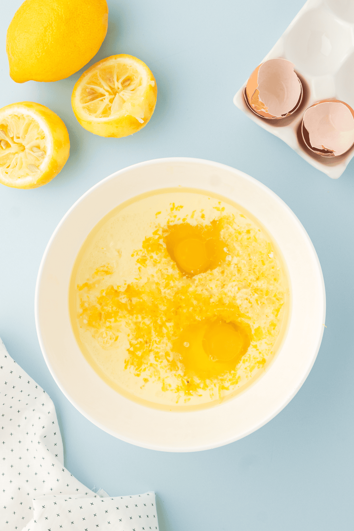 lemon blueberry quick bread wet ingredients in bowl