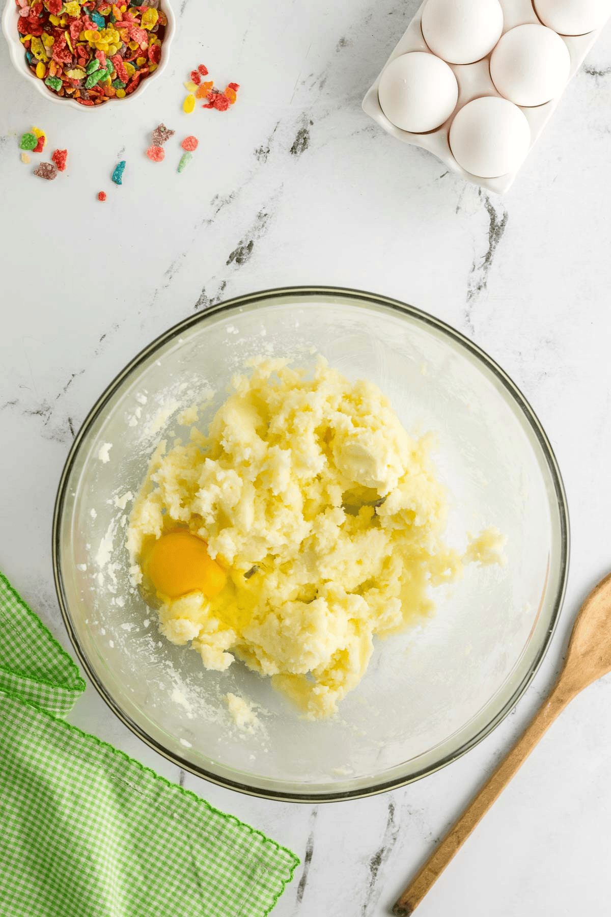 egg added to bowl of creamed butter and sugar