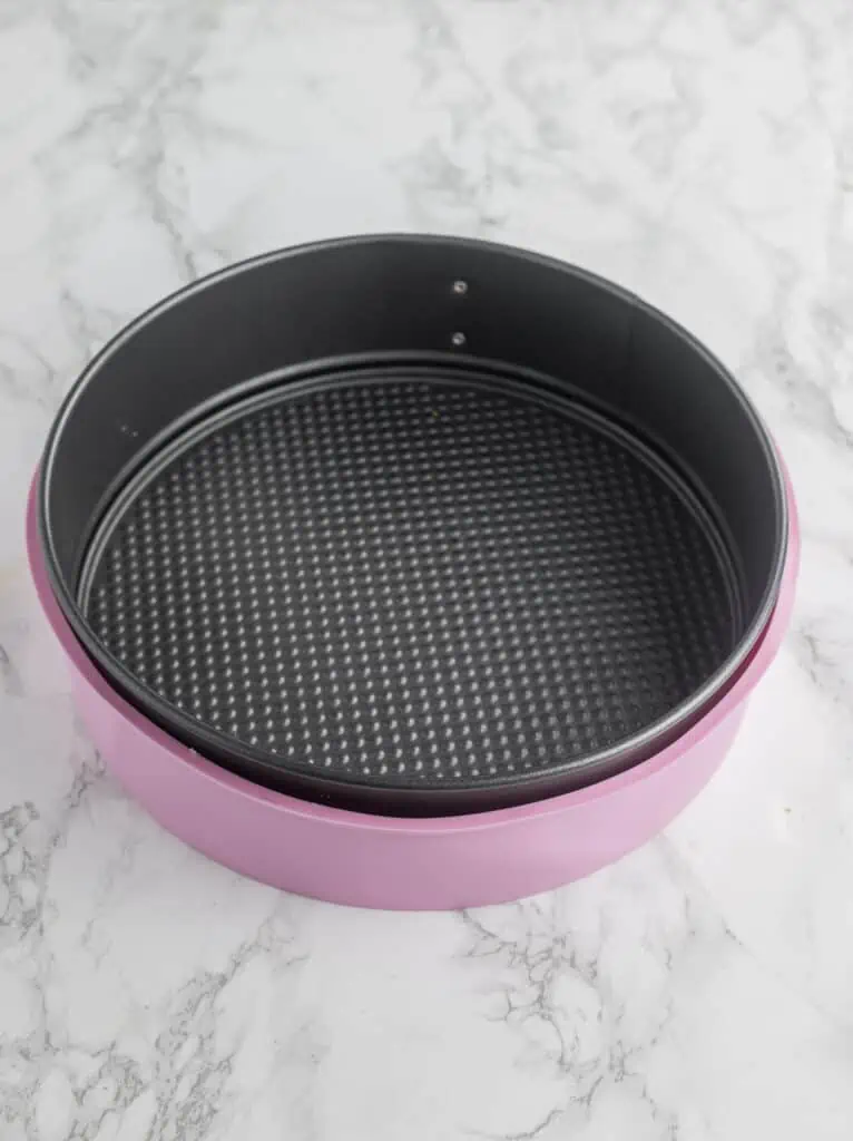 springform pan inside a silicone cake pan