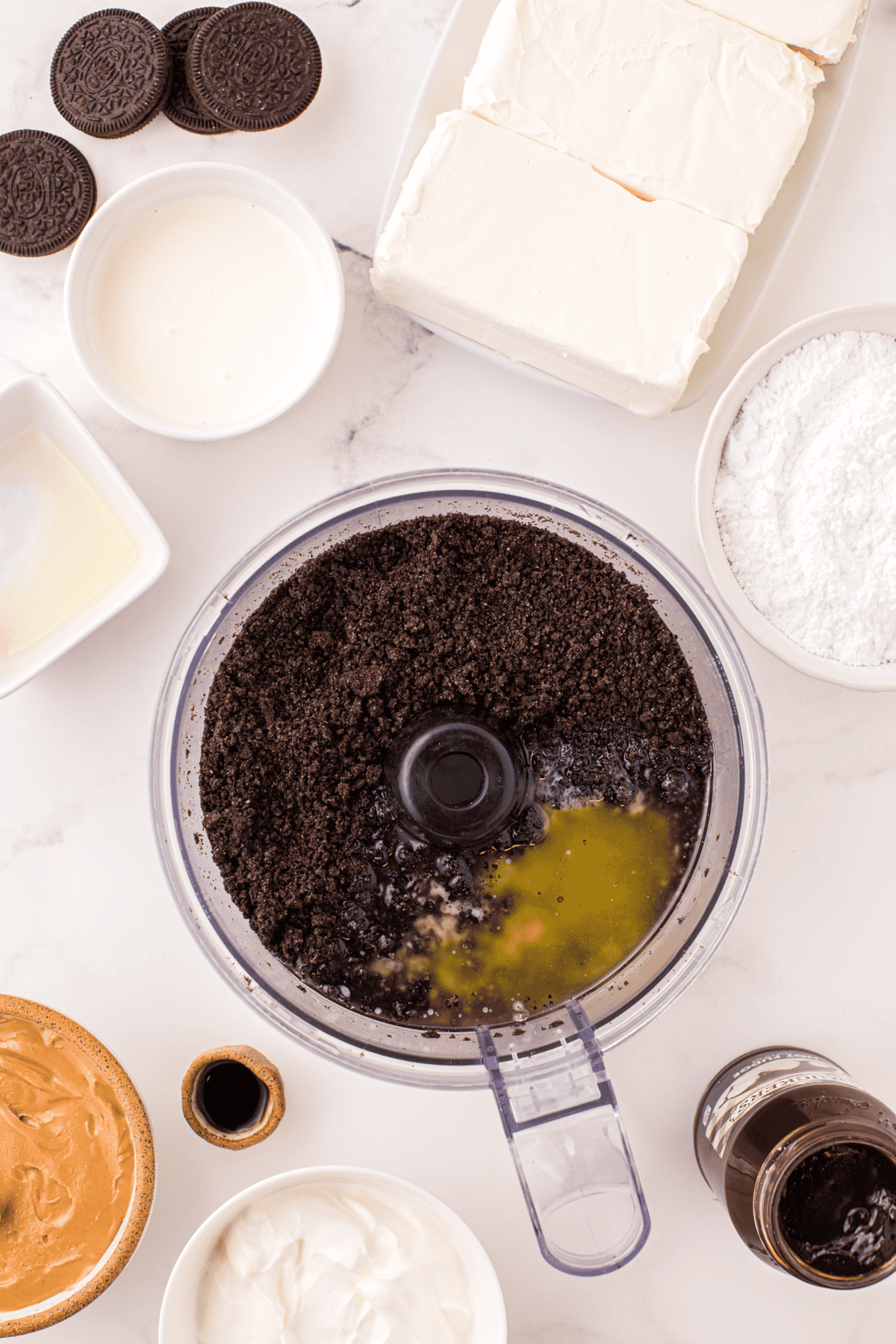 melted butter and crushed Oreos in a food processor