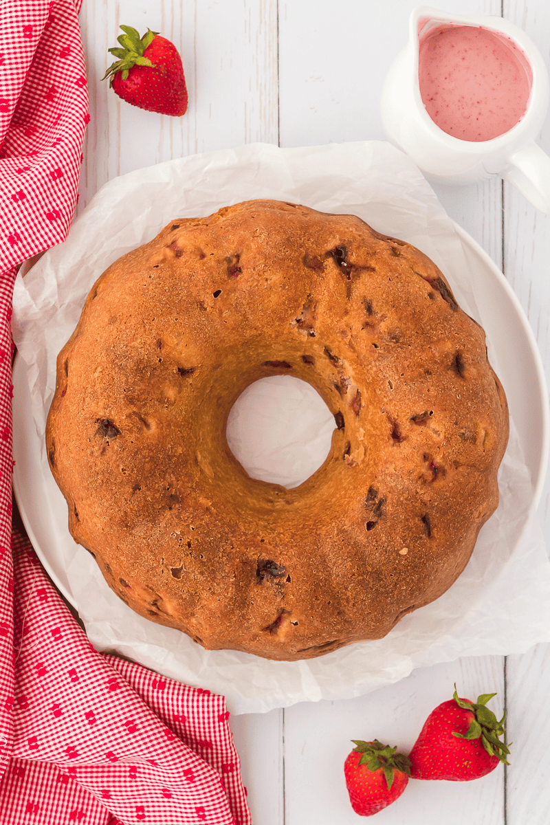 baked strawberry pound cake without strawberry glaze on a plate