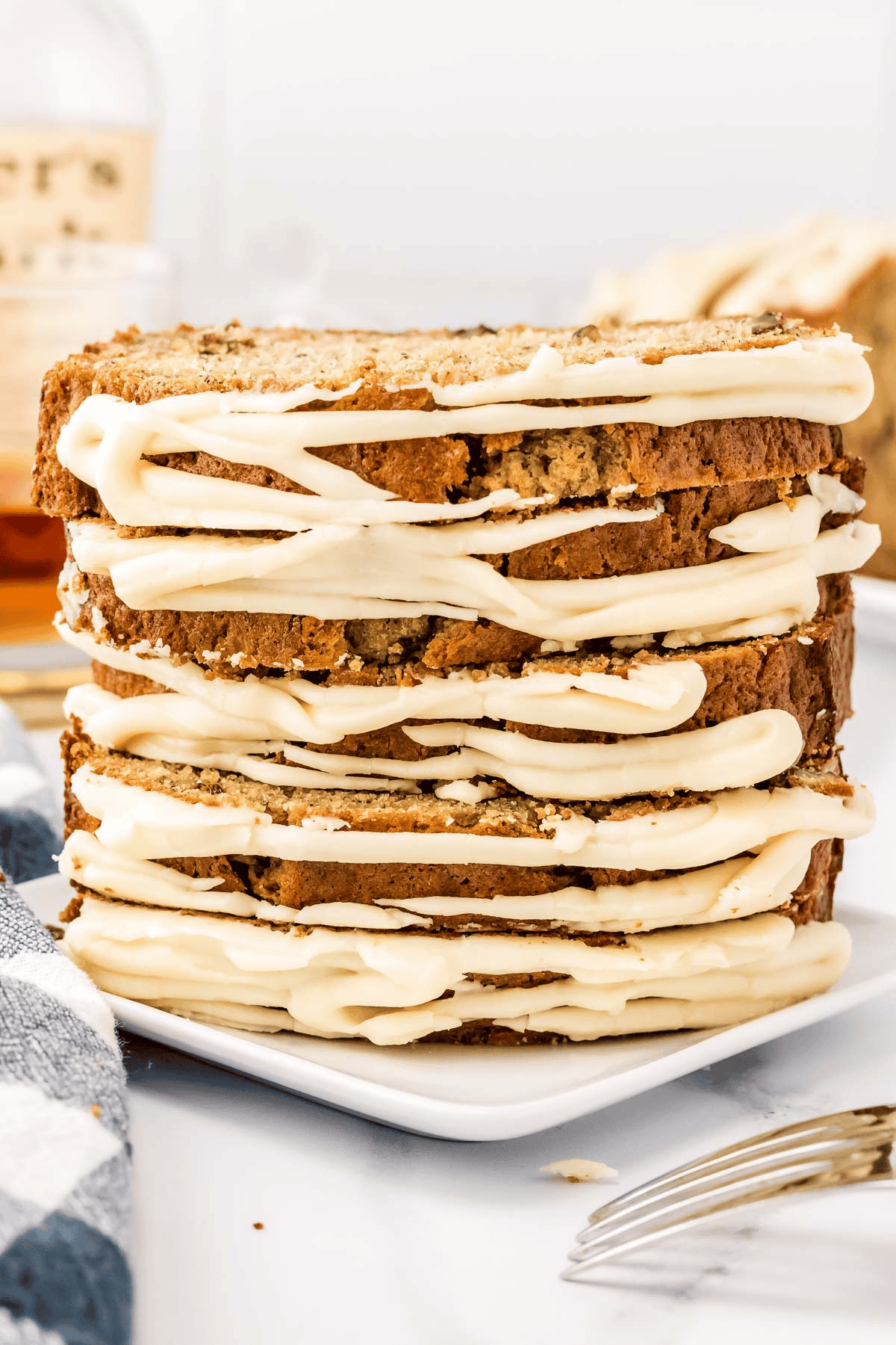 four slices of bourbon banana quick bread stacked
