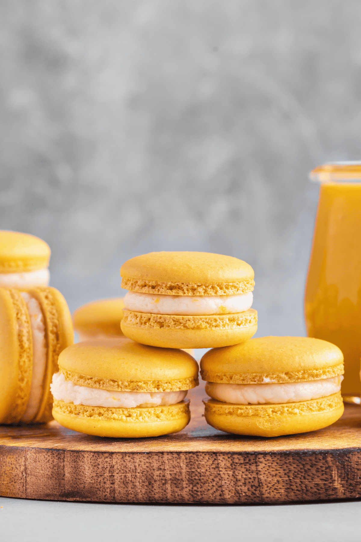 three lemon macarons stacked