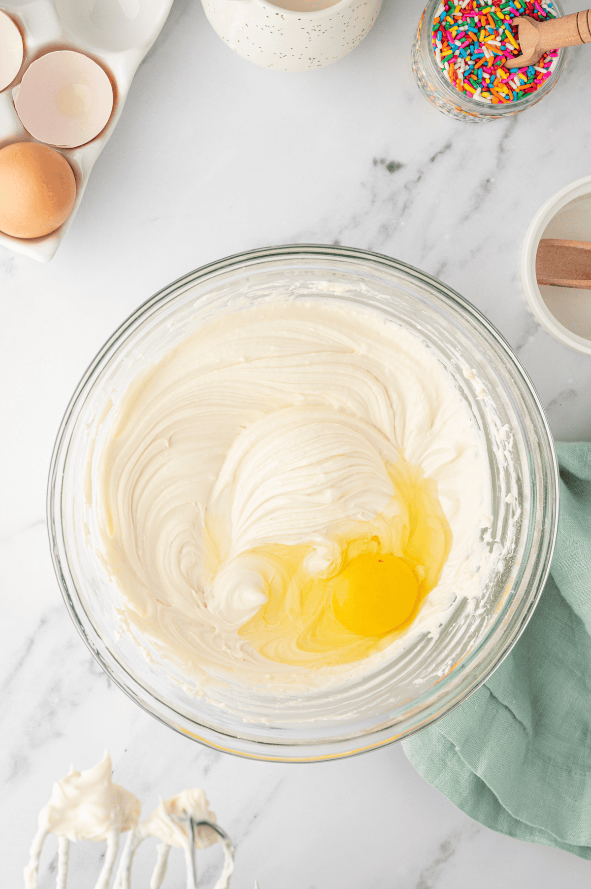 egg added to cream cheese mixture 