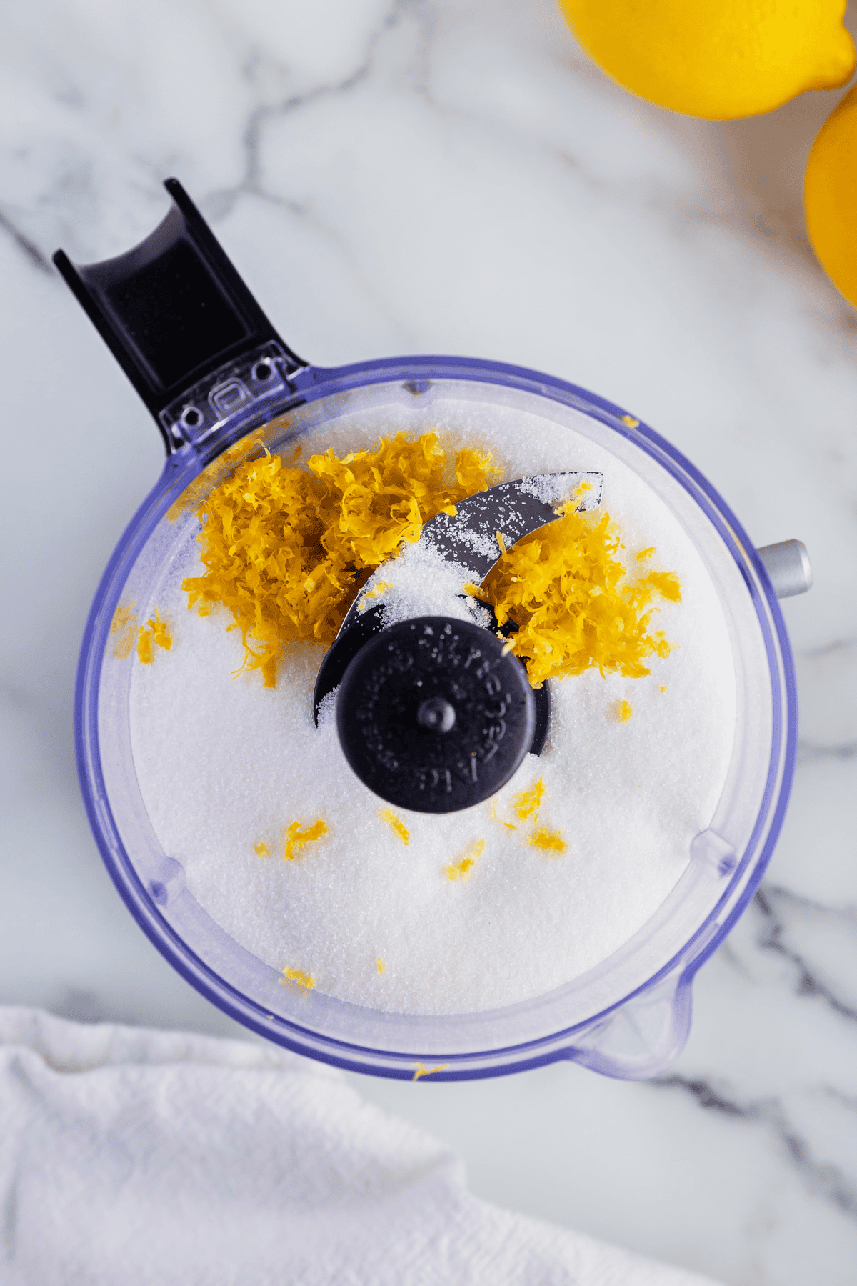 lemon zest and sugar in a food processor