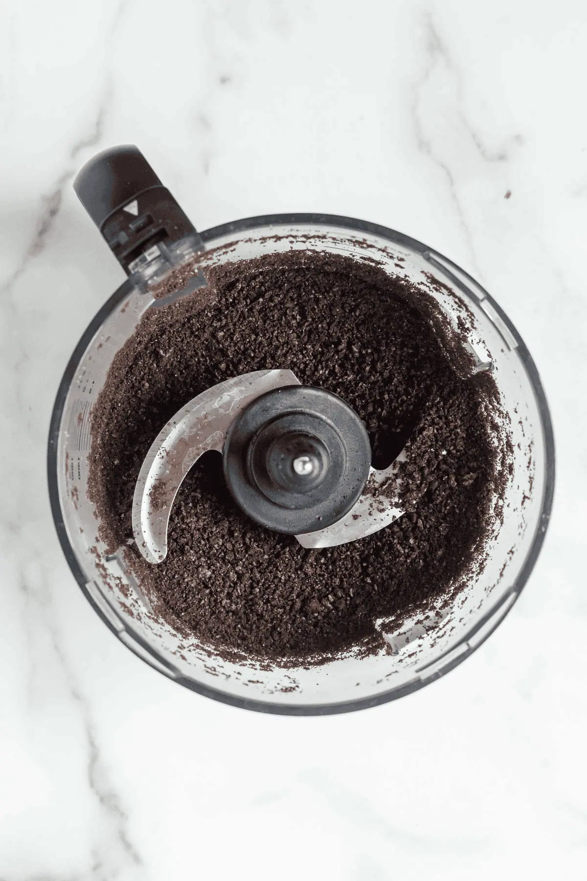 crushed oreo cookies in a food processor