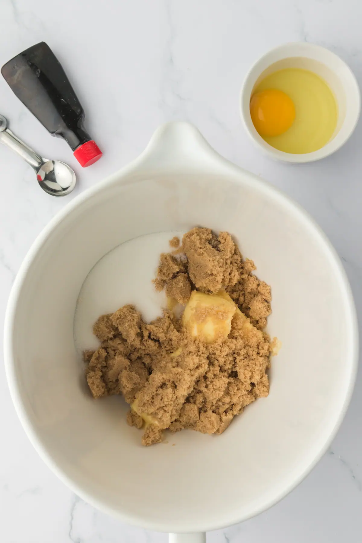 granulated sugar, brown sugar, and softened butter in bowl